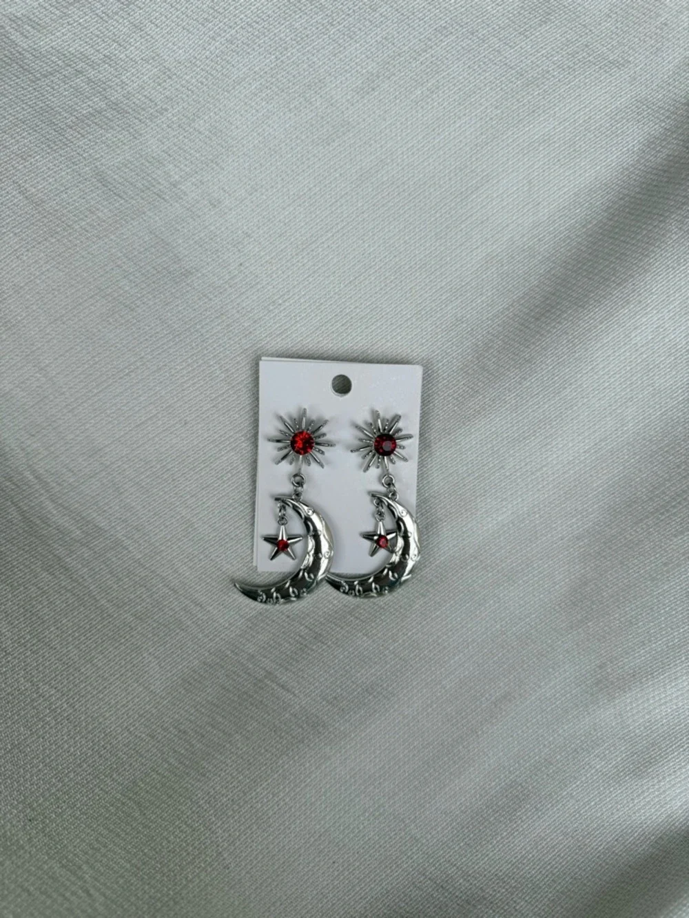 Silver Crescent Moon & Star Drop Earrings with Red Gem Accents